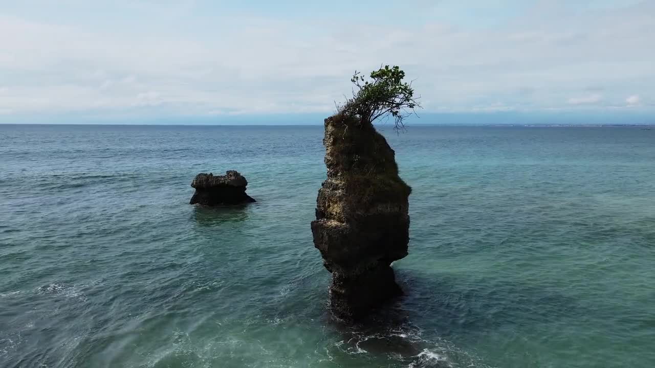 Natural rocks formation by the sea bay