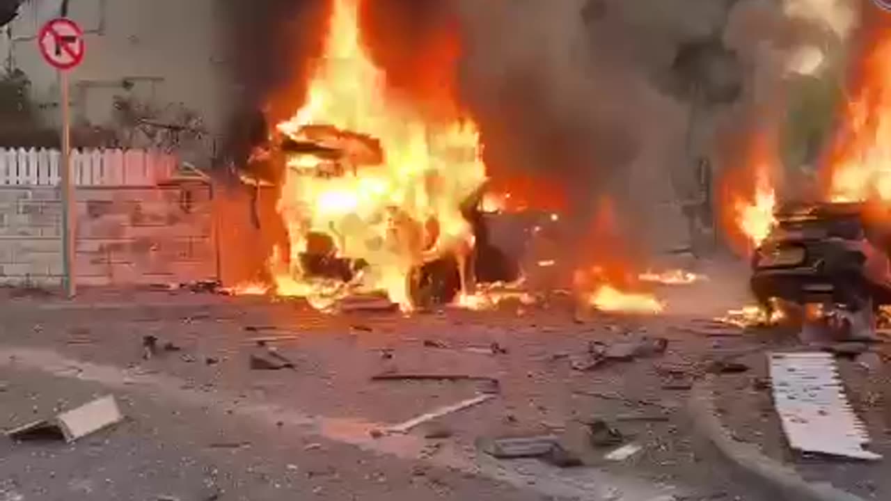 The aftermath of Hezbollah rocket strike near a building in Kiryat Bialik