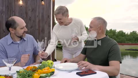 Two Men Sitting, About To Have Dinner