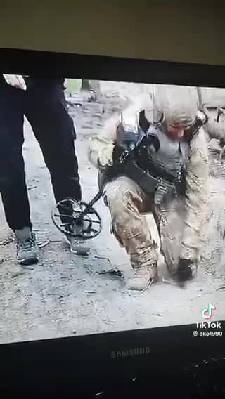 Soldier tracks landmines in Ukraine.