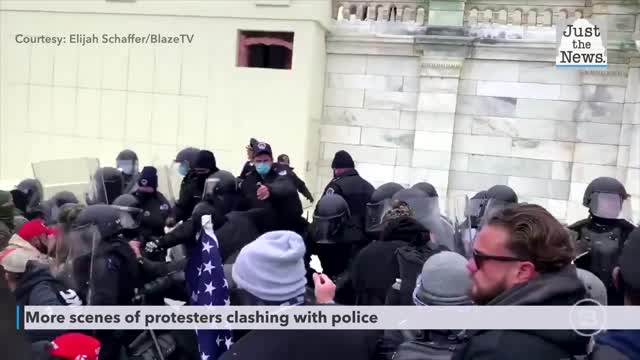 More scenes of protesters clashing with police at the U.S. Capitol