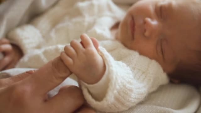 Cute baby with mom and smile