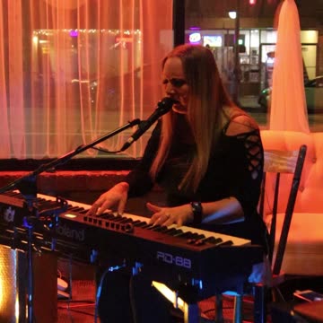 Kat Downs plays at Calavera's in Down Town Appleton Wisconsin