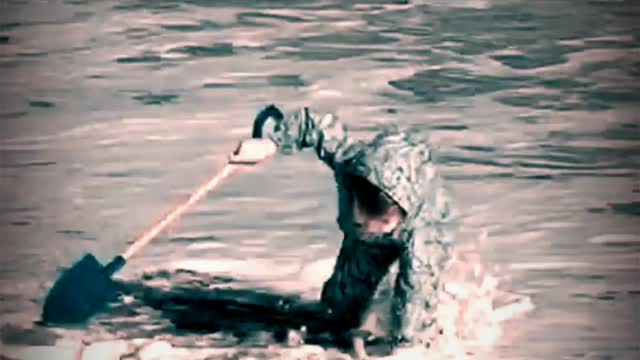 Little Boy Gets Caught up in Waves on Beach