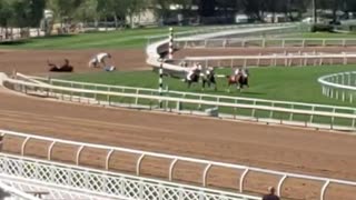 Horses Tumble at the Turn