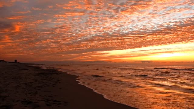 The beach with a pretty sunset