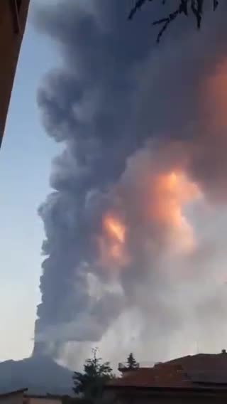 Ash descends like rain as the National Institute of Geophysics and Volcanology in Italy records