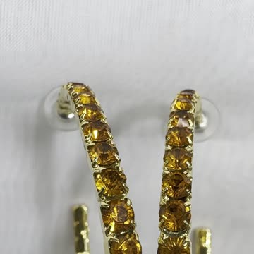 18KGP 2.75” x 2.5” Drop Earrings. Made with Swarovski Crystal. Hoop Earrings