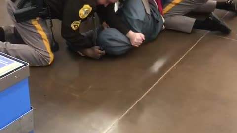 Police Officer Unloads Taser After Tussle