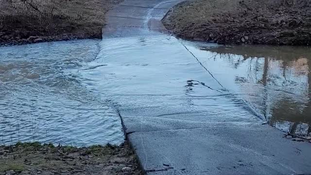 timmy trys to cross stream on bike