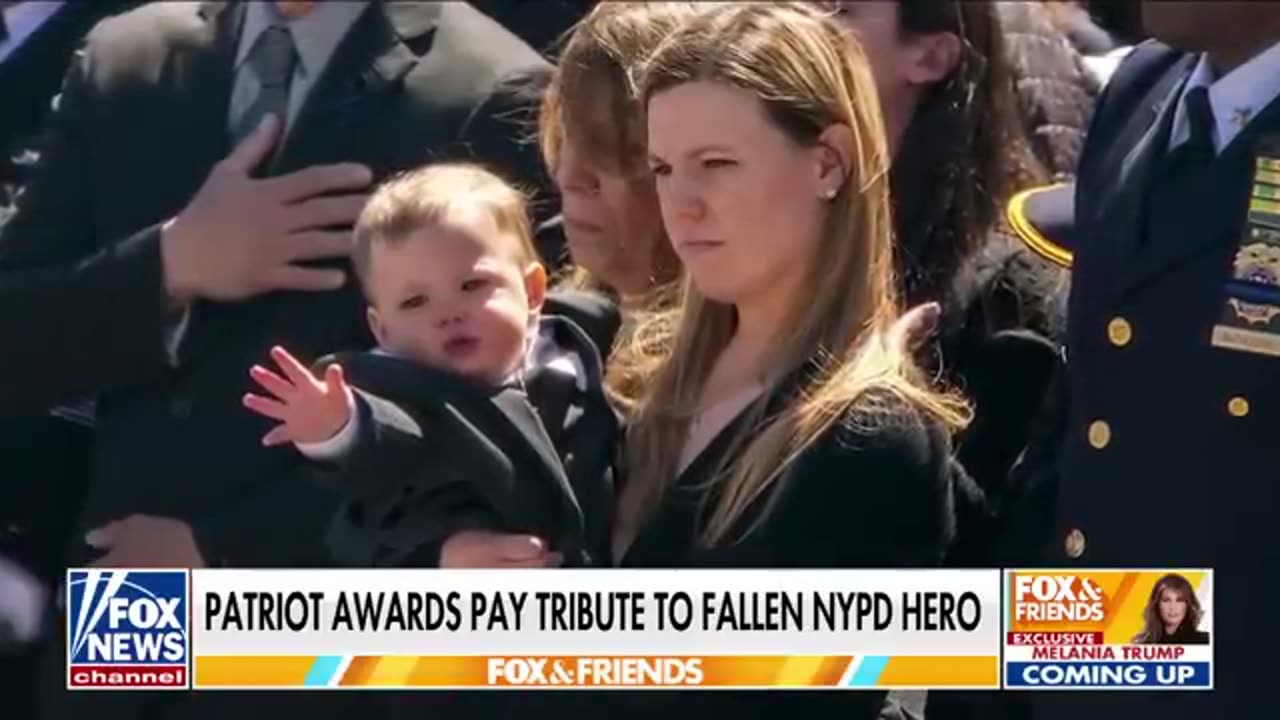 Wife of slain NYPD officer accepts Patriot Award for fallen husband, honoring his sacrifice