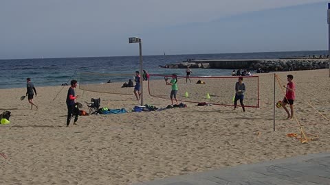 People Playing Volleyball On Beach