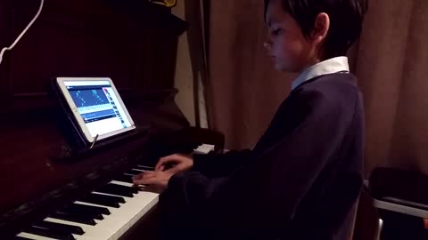 son taught himself piano with ipad help