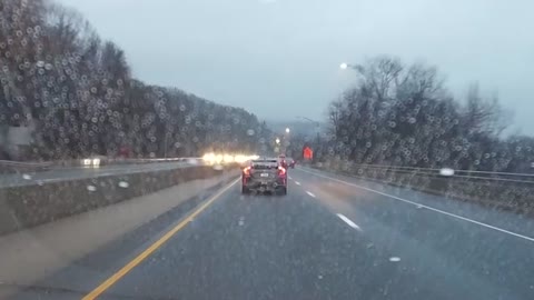 Dangerous Passing in the Breakdown lane in the rain