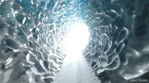 drone flyes into ice tunnel