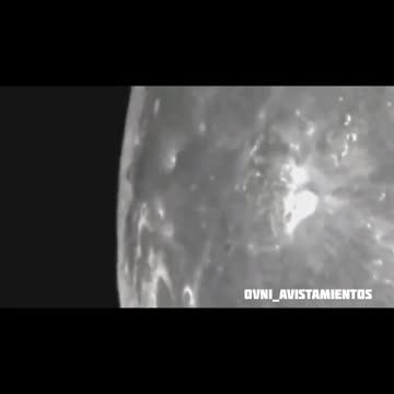 object rising from the moon