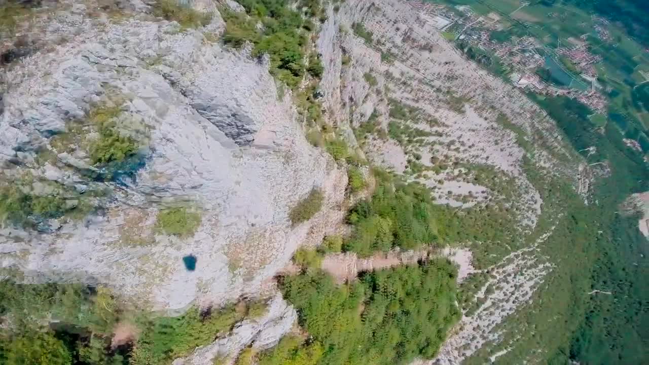 Extreme wingsuit proximity flight over Italian Alps