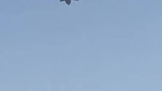 2 people fall off of a moving plane