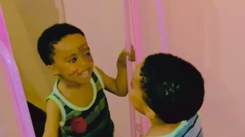 Smiling at the mirror