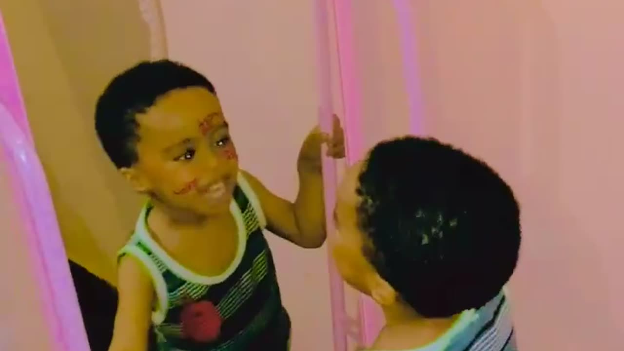 Smiling at the mirror