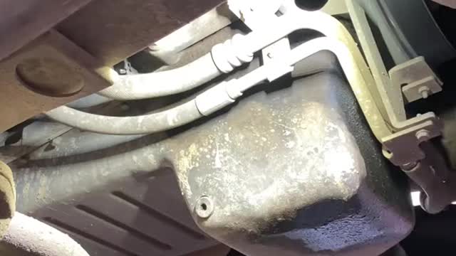 Automobile disassembly and oil discharge