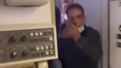Air marshall pulls out gun after passengers attempted to enter the cockpit