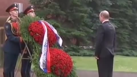 The Great Leader Vladimir Putin giving respect to war heroes