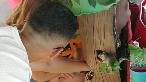 Houston mascot party character Barney plays build the bird nest game at a city ranch birthday