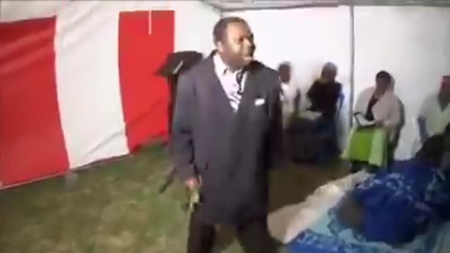 A pastor demonstrating using soccer moves