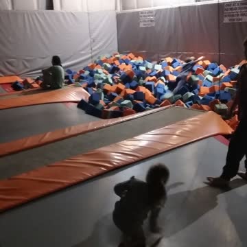 Ijump with my niece and nephew 4