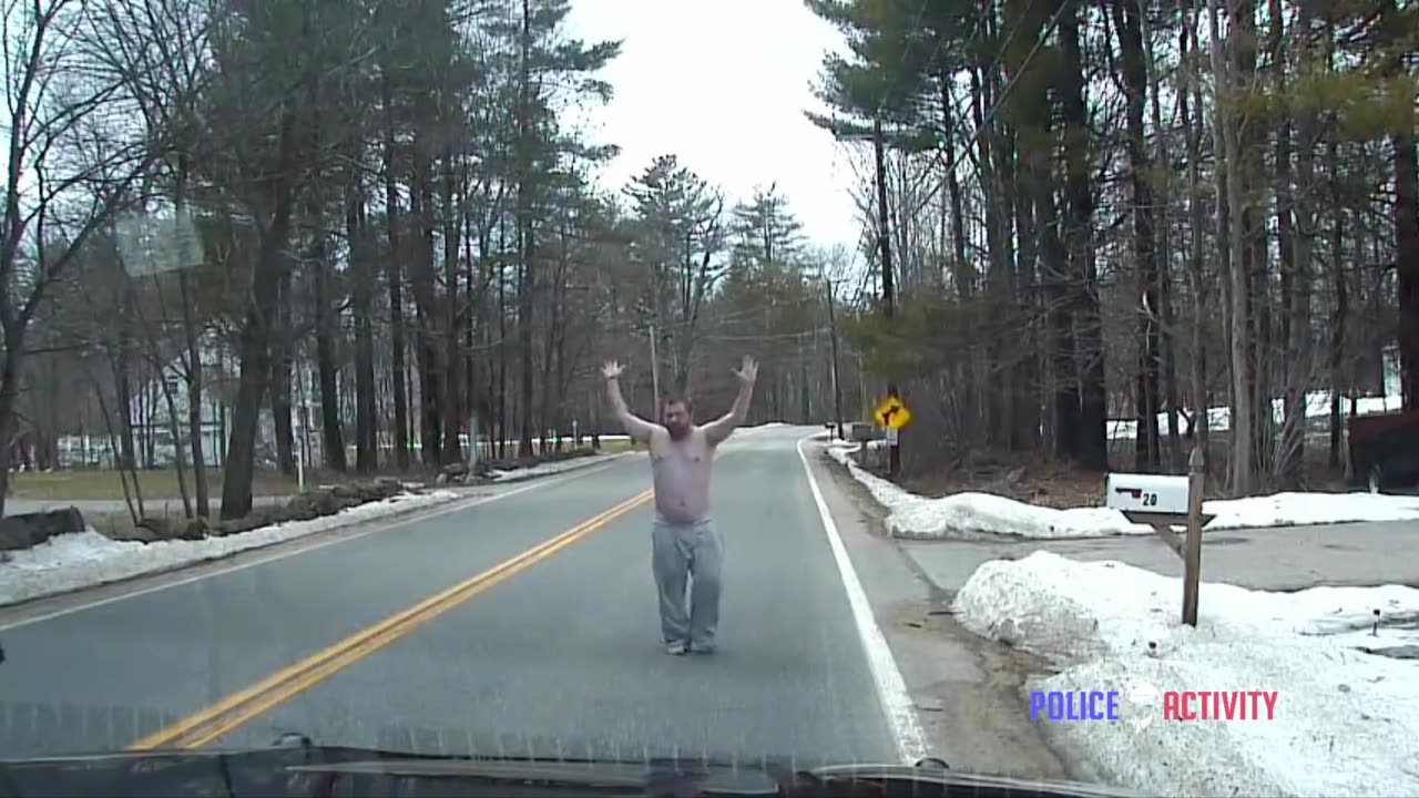 Police Dashcam Shows Arrest Of Intoxicated Man Armed With Knife