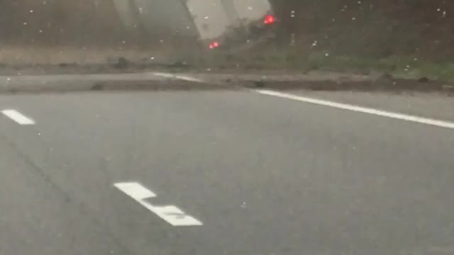 Semi Truck Drifts and Hits Embankment