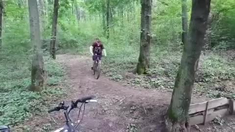 Guy bike mountain small ramp jump fail dirt