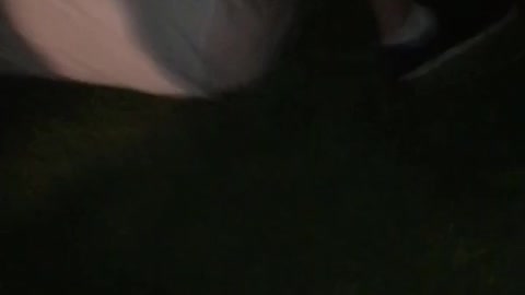 Guy in black hat and white t shirt fail back flip