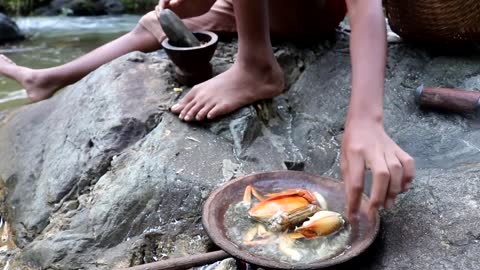 Survival skills_ Find catch crabs at river Boiled on clay for food - Cooking crab eating delicious