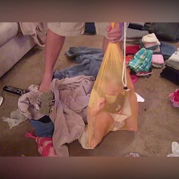 Dad Captures Elusive Wild Baby With Laundry Bag