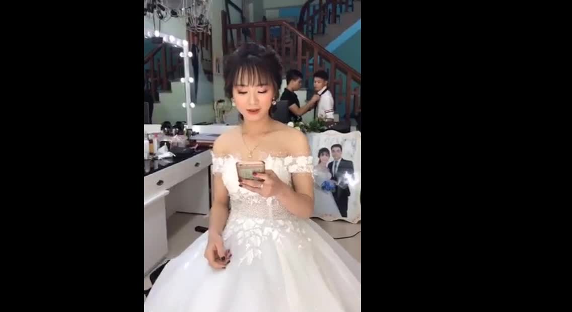Vietnamese bride and groom in beautiful white