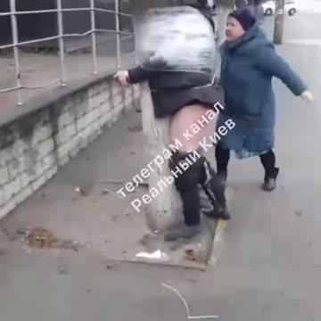 Ukraine: person tied to tree, pants pulled down, beaten