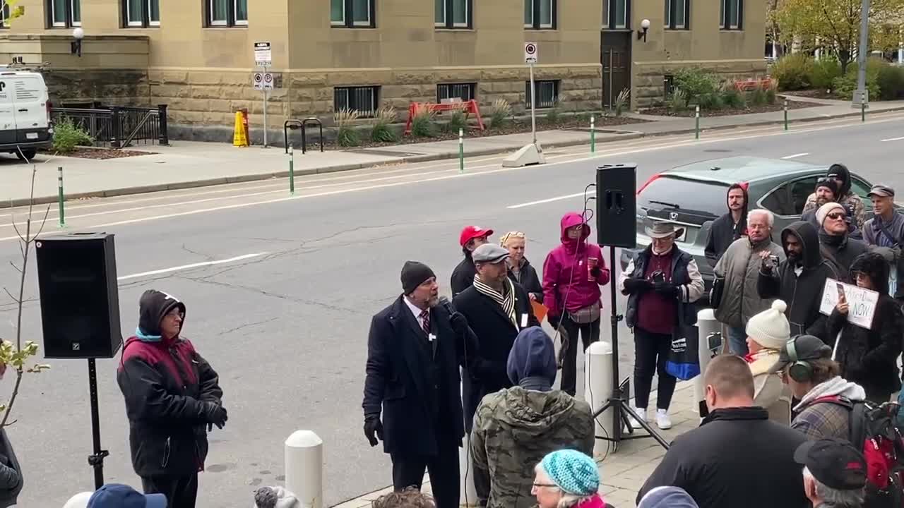 Protest at the Calgary courthouse with pastor Artur Pawłowski