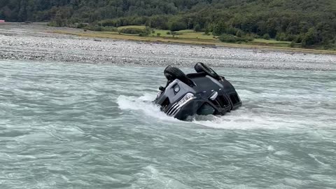 SUV Gets Stuck in Rising River