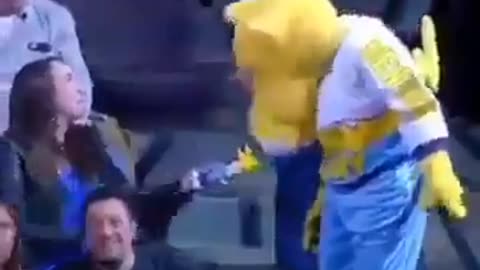 Mascot gives fan a Valentine Day present