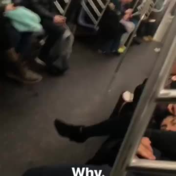 Girl plucks her boyfriend's eyebrows on a subway train