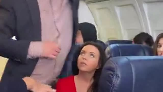 This WOMAN needs to get THROWN off the PLANE