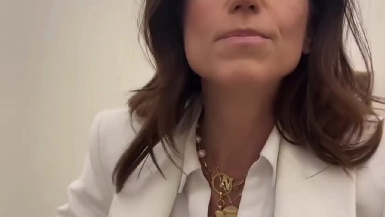 Rep. Nancy Mace throws printout trans flags in the trash can