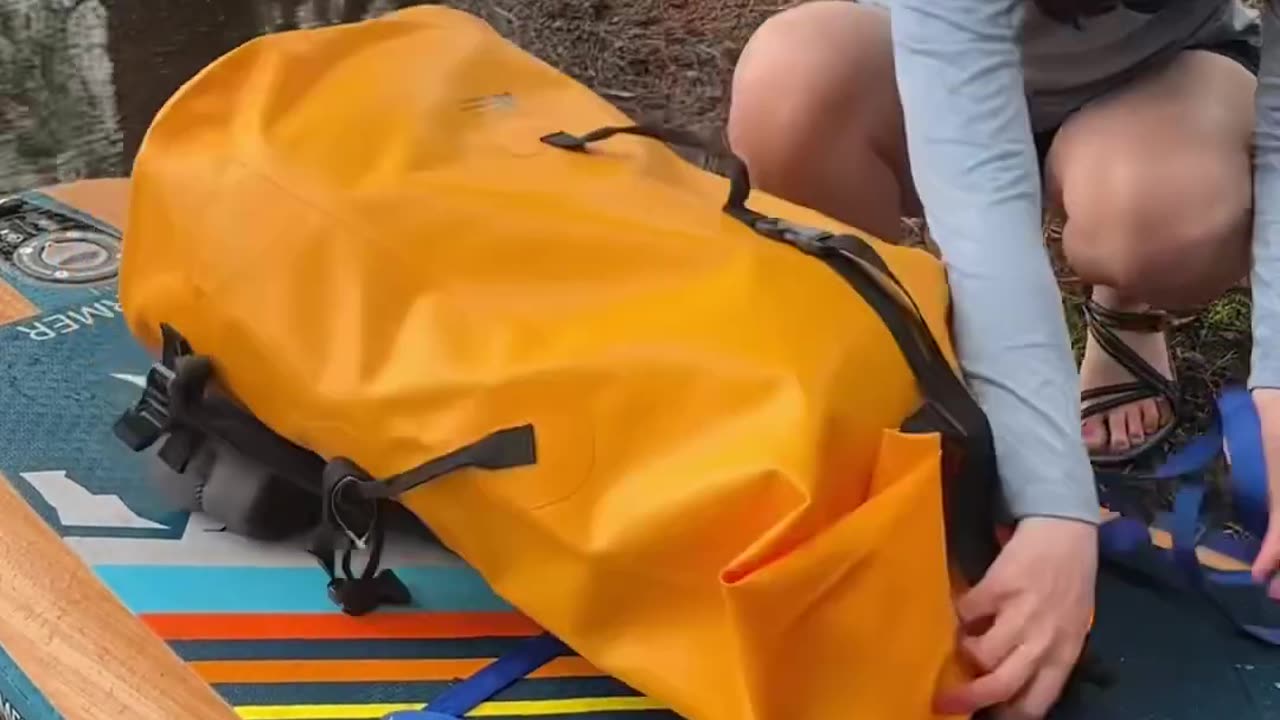 How to pack for paddle board camping - dry bags, NRS strap & what to bring