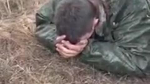 Ukraine Soldiers Take Russian Prisoner