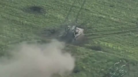 Russian soldiers running from destroyed tank