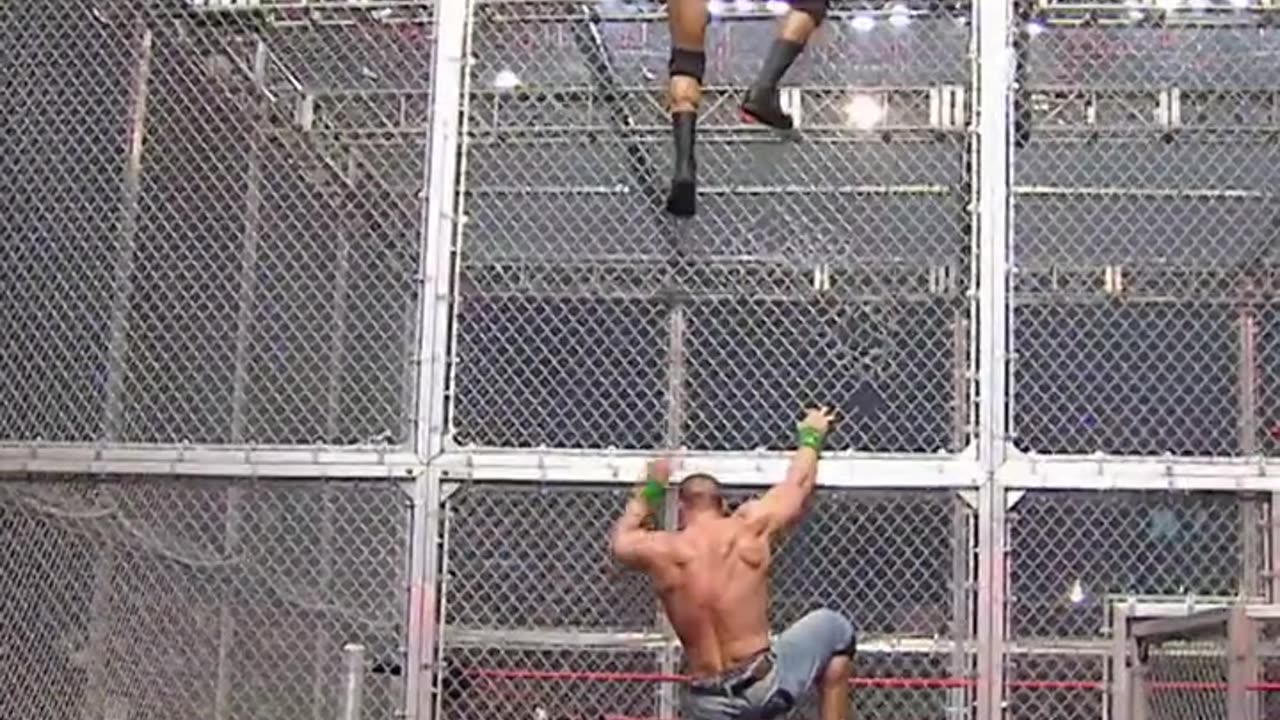 Randy Orton & John Cena brawl on top of HIAC