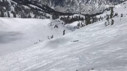 Guy in red failed back flip ski