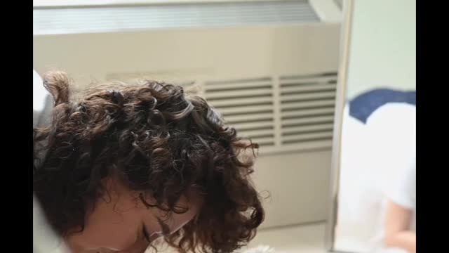 Vertical Video of a Woman Kissing a Cat on the Floor#cat990 #cat #shorts